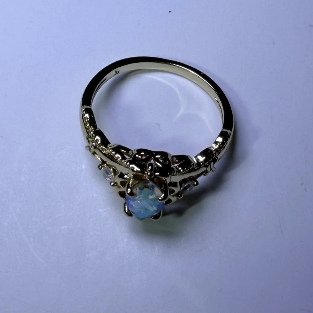 Fragrant Jewels Gold Tone Marquise Iridescent Stone Filigree Bow Ring Size 8.25